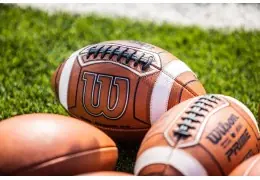 The World of Wilson Footballs: Understanding the Difference Between an Official Game Ball and a Composite Football